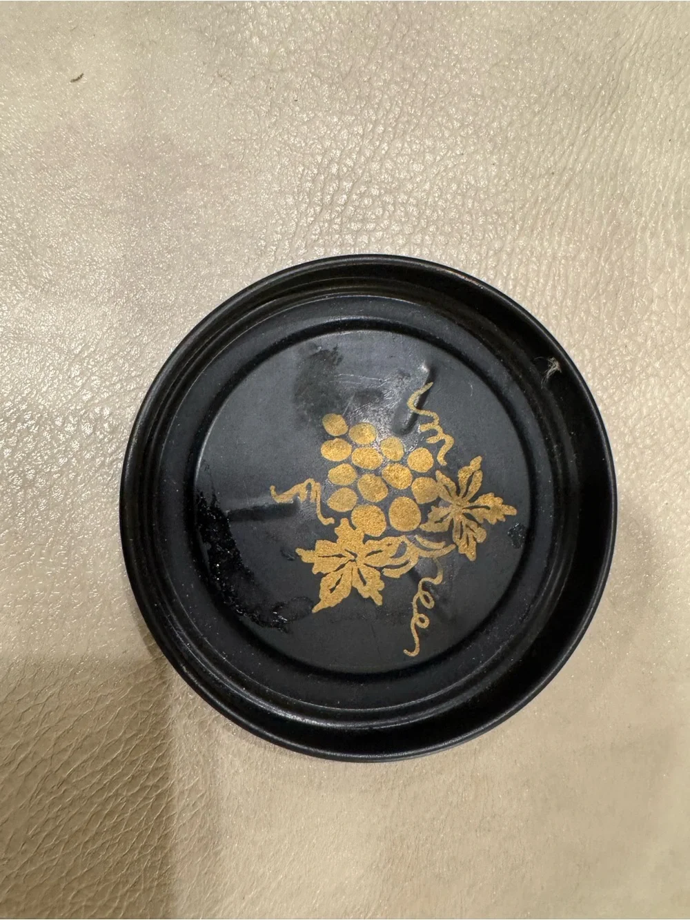 Vintage mid-century black and gold metal tray and coaster